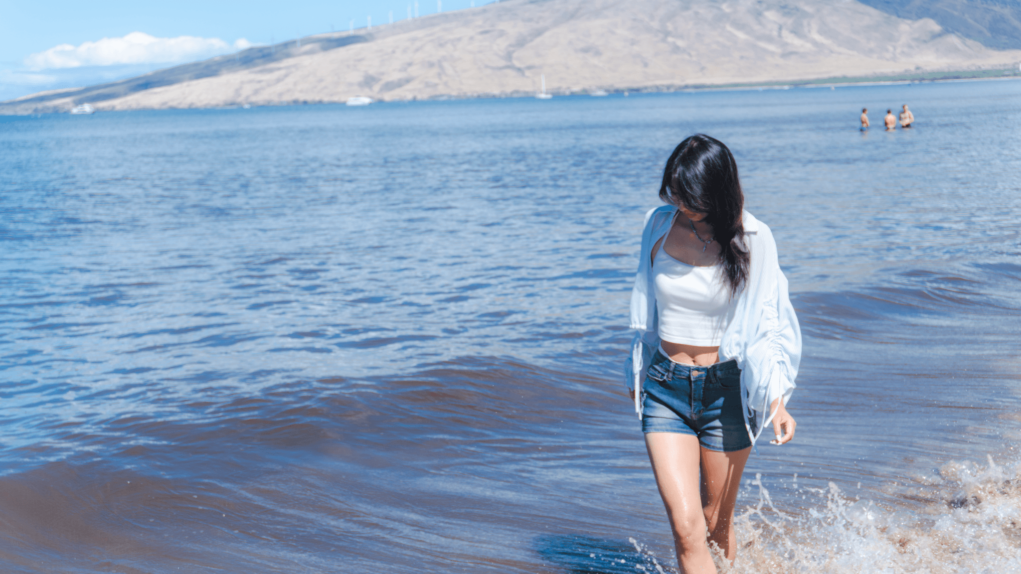 Joelle walking on the beach